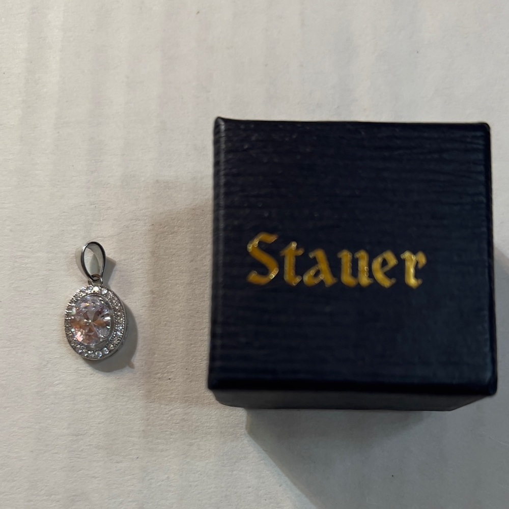 Stauer oval shaped white topaz and diamond aura halo pendant 14k white gold